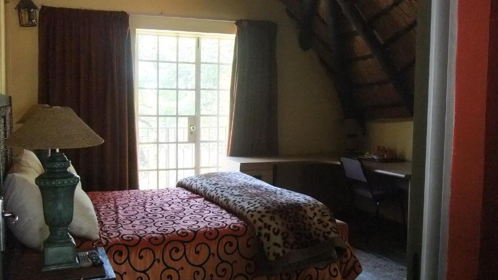 Treetops & Treats Guest House بريتوريا الغرفة الصورة